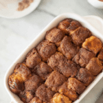 Freshly baked easy monkey bread with glaze on a wooden table