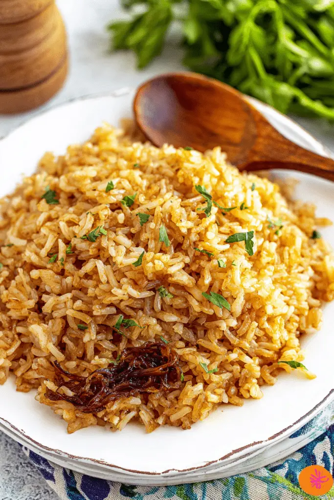 Delicious and creamy Stick of Butter Rice garnished with herbs, ready to serve.