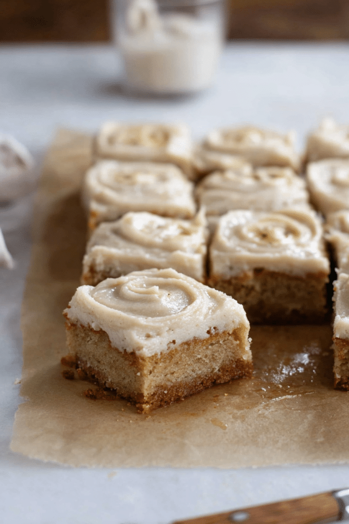 Delicious banana bars with brown butter icing and banana slices on top