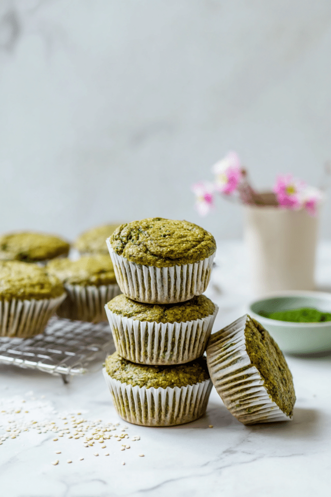 Close-up of kid-friendly banana spinach muffins, displaying their moist texture and healthy spinach, perfect for breakfast or snacks.