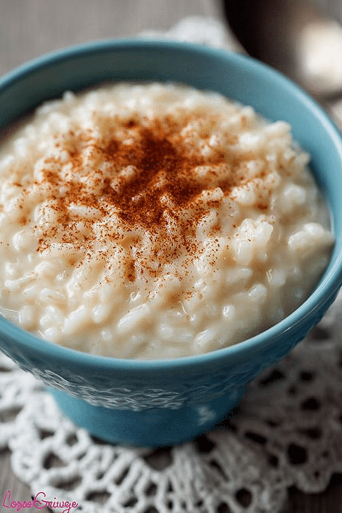 Close-up of creamy rice pudding in a bowl with cinnamon sprinkle on top