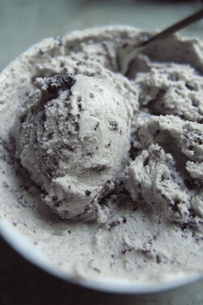 Delicious blueberry ice cream shaved ice topped with fresh blueberries and whipped cream