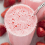 Refreshing easy strawberry smoothie with fresh strawberries and mint garnish