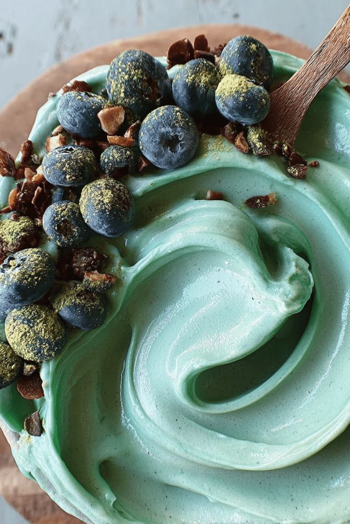 Ocean smoothie bowl with banana and mango toppings, perfect for breakfast or dessert.